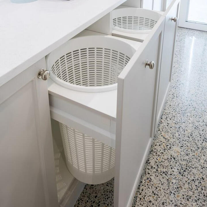 Hidden hampers or pull out bins 